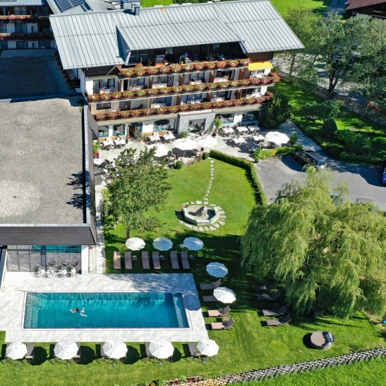 hotel rauriserhof sommer tennis pool aussen