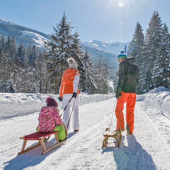 rauris winterurlaub salzburger land rodeln familie